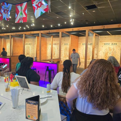 Epic Axe Throwing people enjoy axe throwing event