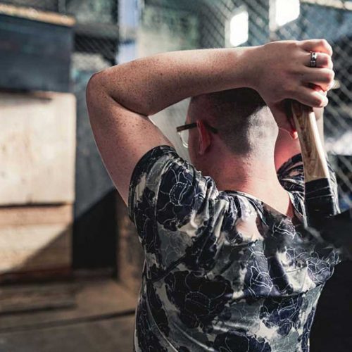 Epic Axe Throwing man's aiming with an axe